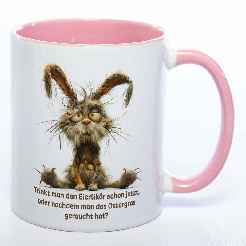Motiv - Tasse mit Spruch und Hase: Trinkt man den Eierlikör schon jetzt, oder nachdem man das Ostergras geraucht hat? spülmaschinenfest
