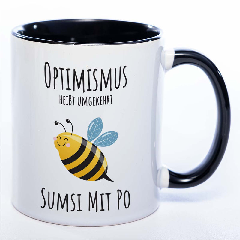 Lustige Tasse „Optimismus – Sumsi mit Po“