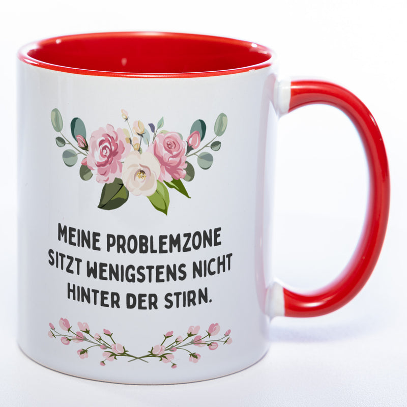 Blümchen-Tasse mit Spruch "Meine Problemzone sitzt wenigstens nicht hinter der Stirn." - Lustige Kaffeetasse spülmaschinenfest