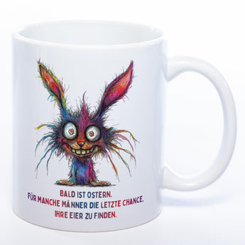 Motiv - Tasse mit Spruch und crazy Hase: "Bald ist Ostern. Für manche Männer die letzte Chance, ihre Eier zu finden." spülmaschinenfest