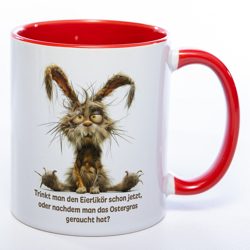 Motiv - Tasse mit Spruch und Hase: Trinkt man den Eierlikör schon jetzt, oder nachdem man das Ostergras geraucht hat? spülmaschinenfest