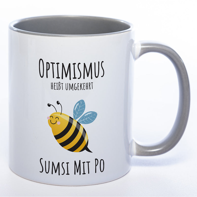 Lustige Tasse „Optimismus – Sumsi mit Po“